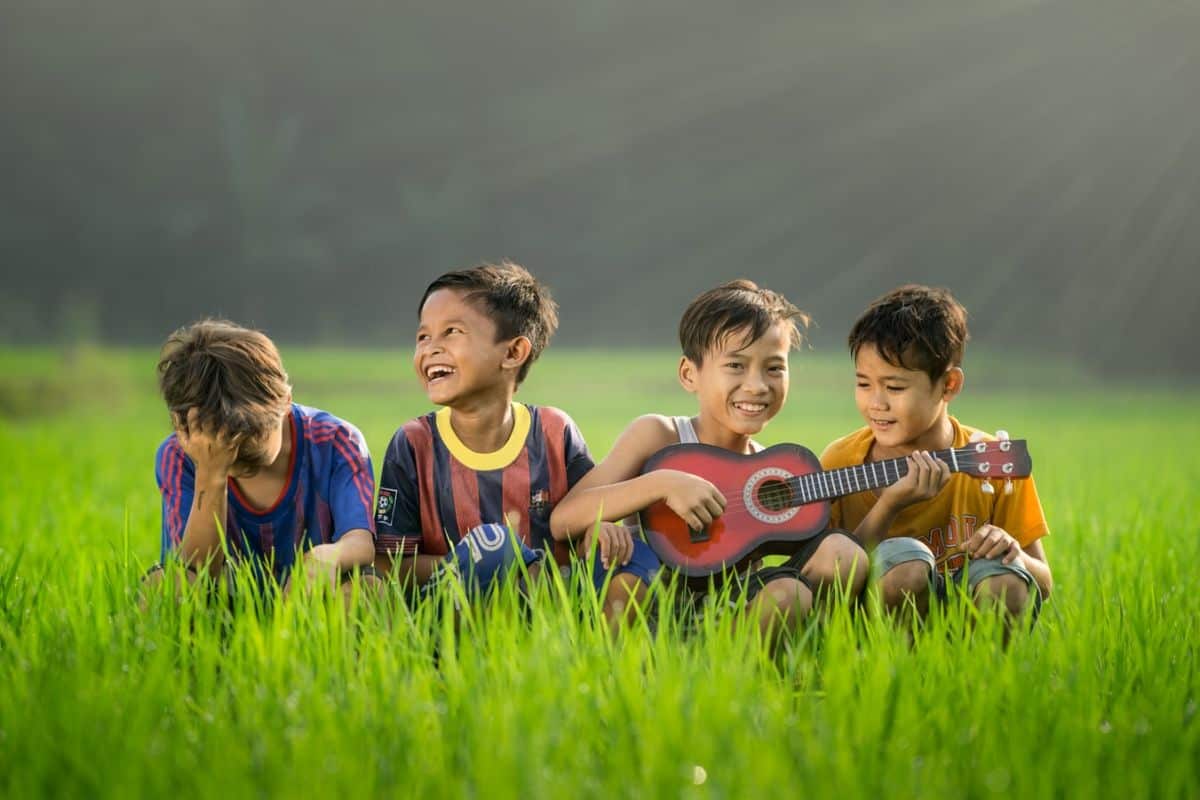 kids playing in field